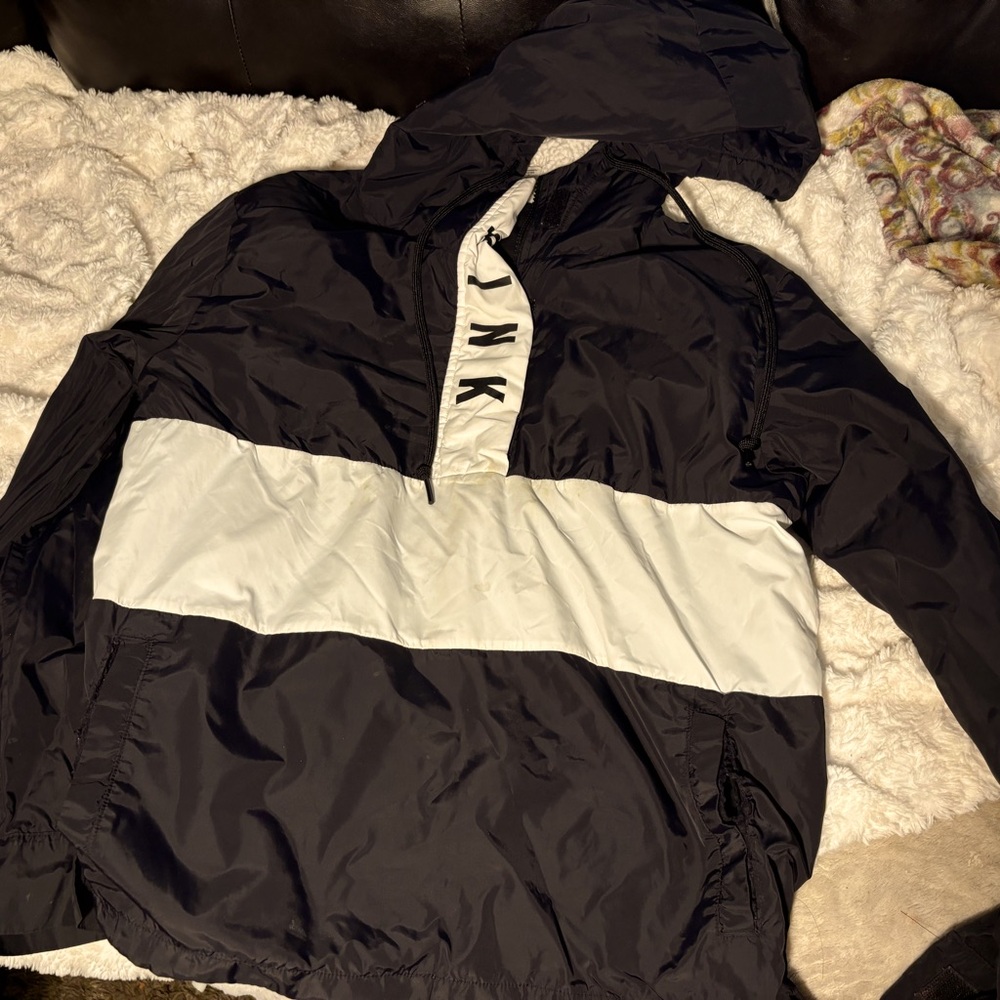 Pink, black and white windbreaker